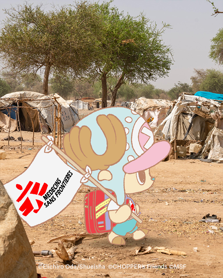 Chopper pasando frente a unos edificios destruidos